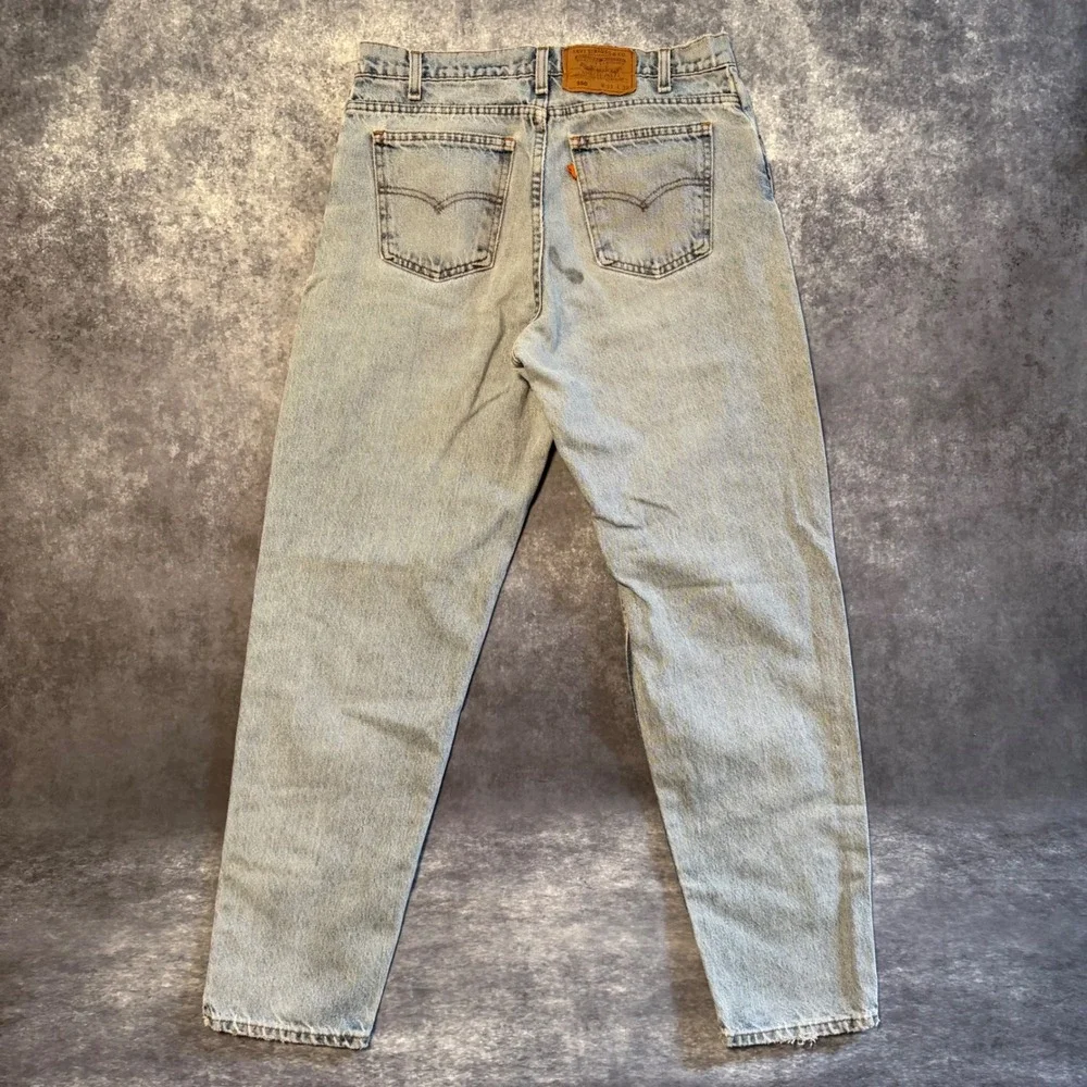 VTG Levis 550 Orange Tab Relaxed Fit Tapered Leg Jeans 33x32 Light Wash Made USA